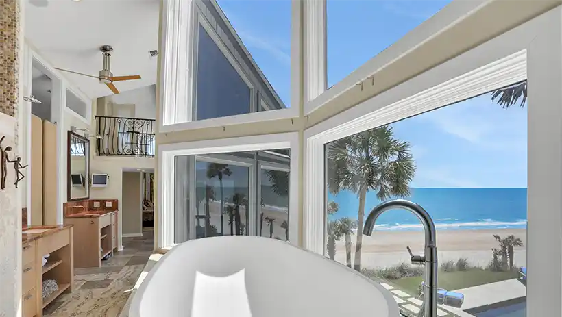 tub with panoramic ocean views